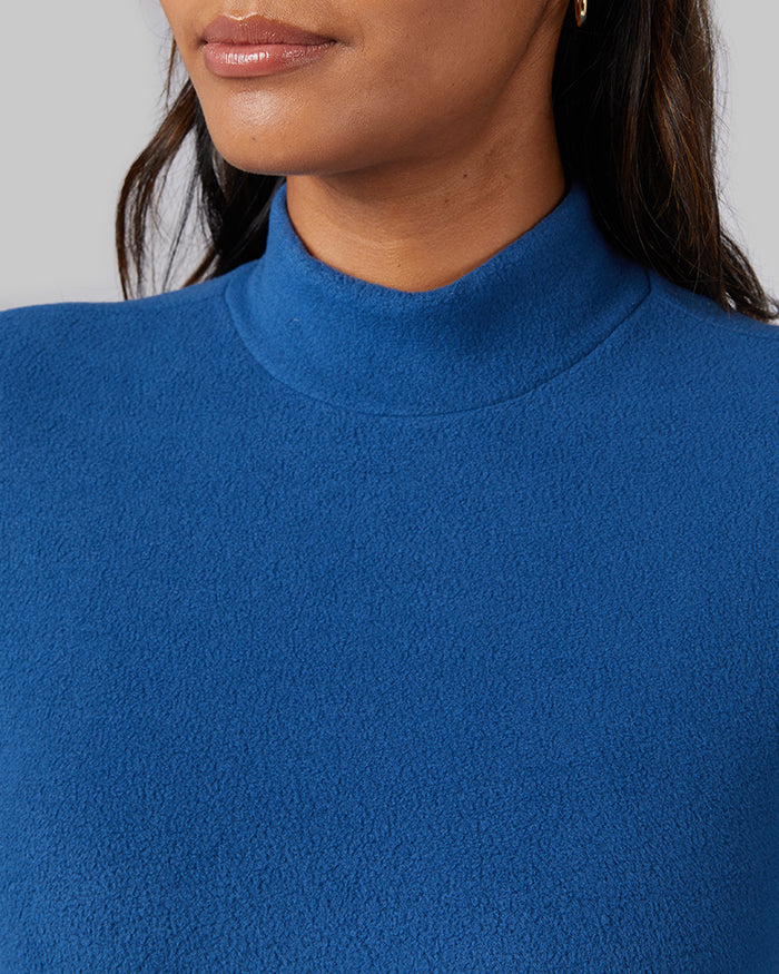 32 Degrees Navy Peony _ Women's Heavyweight Fleece Baselayer Mock Top {model: Victoria is 5'10" and size 4, wearing size S}{bottom}{right}{bottom}{right}