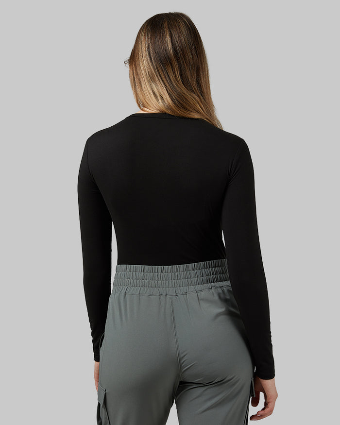 32 Degrees Black _ Women's Lightweight Baselayer Crew Top {model: Julia is 5'8"and size 4 wearing size S}{bottom}{right} {bottom}{right}
