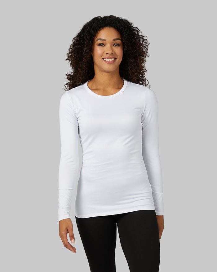 32 Degrees White _ Women's Lightweight Baselayer Crew Top {model: Alexis is 5'6"and size 4-6 wearing size S}{bottom}{right} {bottom}{right}