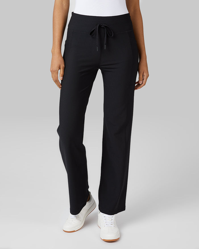 32 Degrees Black _ Women's High-Waist Active Rib Flare Pant {model: Lisa-Marie is 5'9"and size 2-4 wearing size S}{bottom}{right} {bottom}{right}