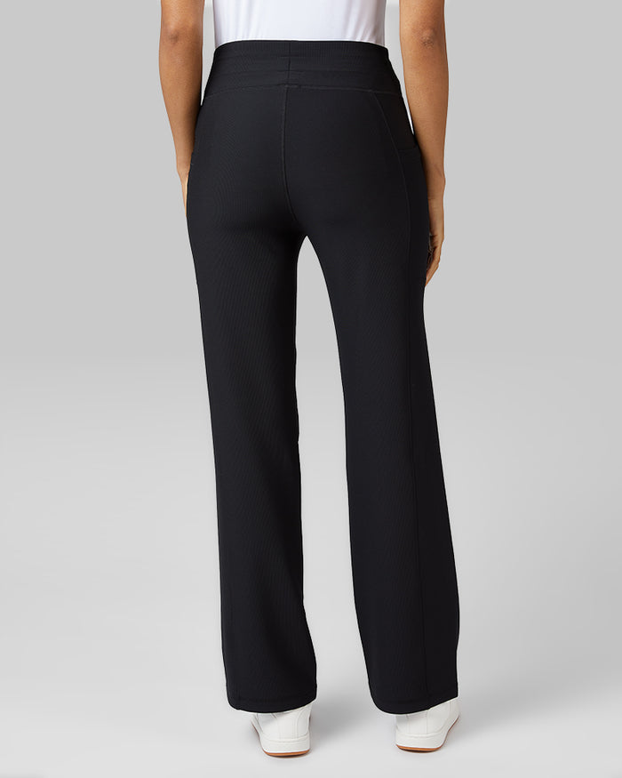 32 Degrees Black _ Women's High-Waist Active Rib Flare Pant {model: Lisa-Marie is 5'9"and size 2-4 wearing size S}{bottom}{right} {bottom}{right}