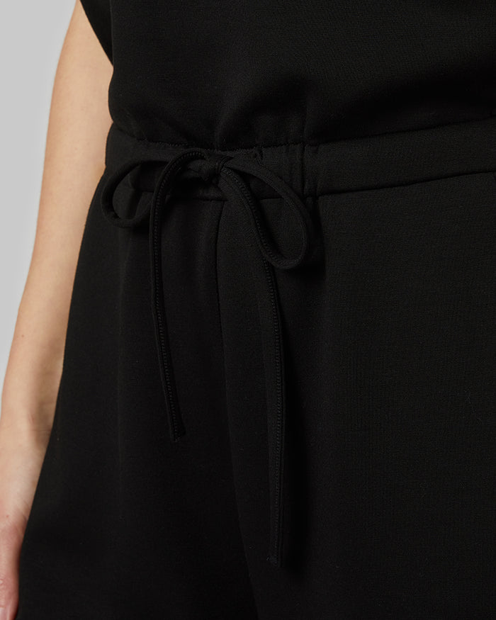 32 Degrees Black _ Women's studio Tech Jumpsuit {model: Monica is 5'8"and size 4 wearing size S}{bottom}{right} {bottom}{right}