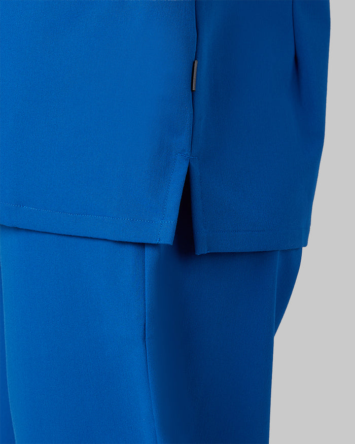 32 Degrees Royal _ Women's 2-Pocket V-Neck scrub Top {model: Colby is 5'9"and size 4 wearing size S}{bottom}{right} {bottom}{right}