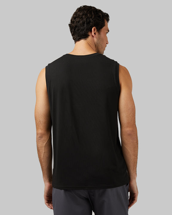 32 Degrees Black _ Men's Cool Relaxed Tank {model: Fran is 6'2", wearing size M}{bottom}{right} {bottom}{right}