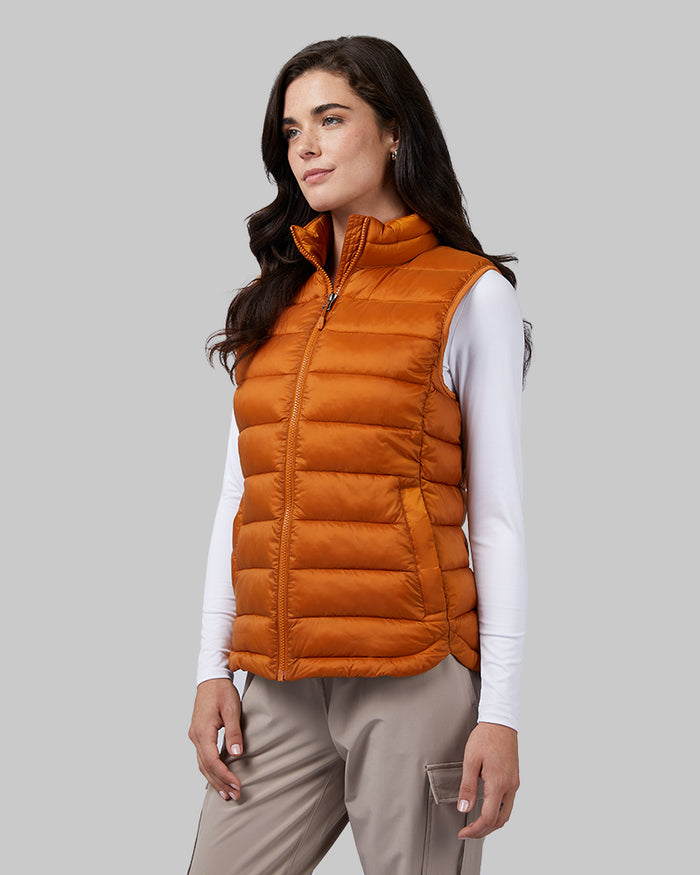 32 Degrees Pumpkin Spice _ Women's Lightweight Recycled Poly-Fill Packable Vest {model: Katie is 5'10" and size 4, wearing size S}{bottom}{right}{bottom}{right}
