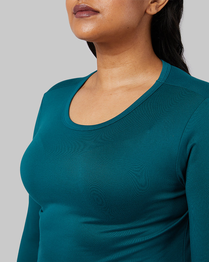 32 Degrees Deep Teal _ Women's Lightweight Baselayer Crew Top {model: Nikita is 5'10" and size 12, wearing size L}{bottom}{right}{bottom}{right}
