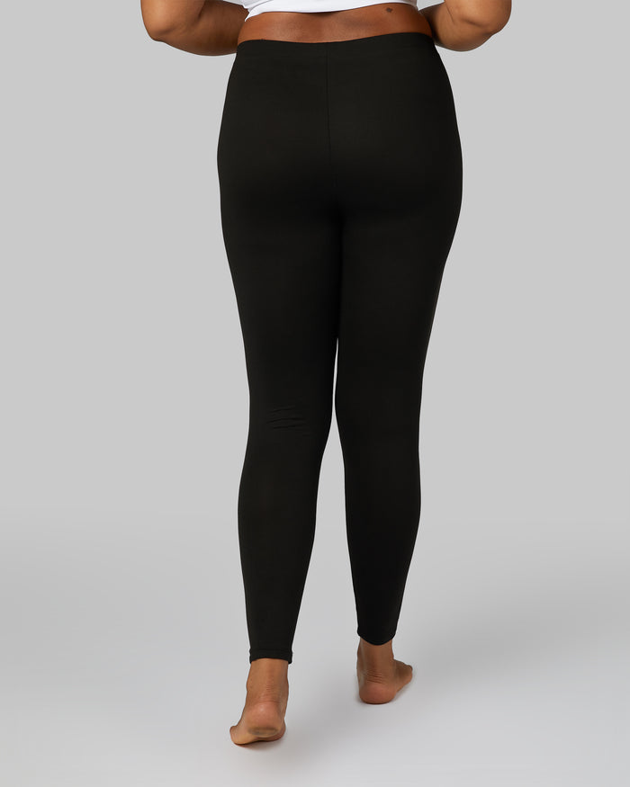 32 Degrees Black _ Women's Lightweight Baselayer Legging {model: Alexis is 5'6" and size 4-6, wearing size S}{bottom}{right}{bottom}{right}