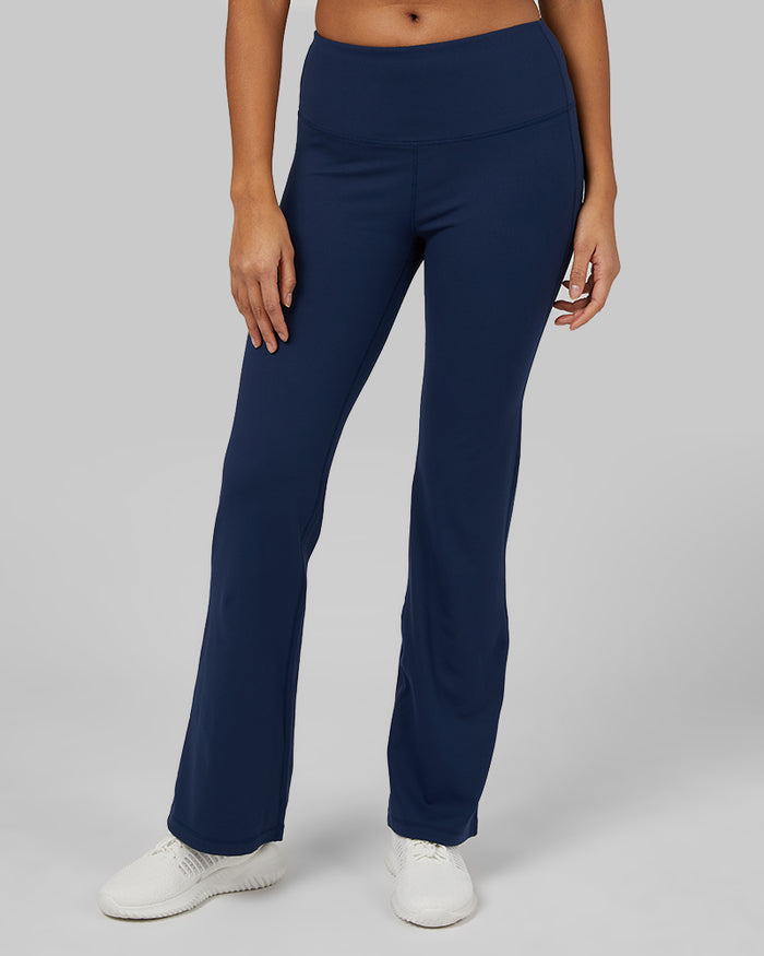 32 Degrees Inky Indigo _ Womens High-Waist Active Flare Pant {model: Victoria is 5'10" and size 4-6, wearing size S}{bottom}{right} {bottom}{right}