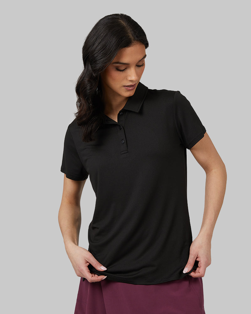 32 Degrees Black _ Womens Cool Fitted Polo {model: Rowena is 5