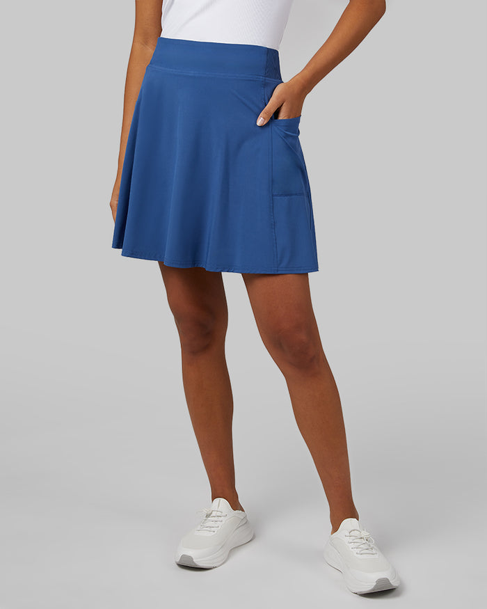 32 Degrees True Navy _ Women's Flyweight Woven skort {model: Meli is 5'9"and size 4 wearing size S}{bottom}{right} {bottom}{right}