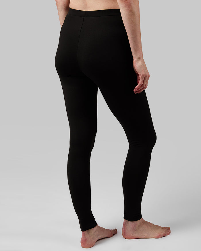 32 Degrees Black _ Women's Midweight Baselayer Legging {model: Kaitlyn is 5'9" and size 2 wearing size S}{bottom}{right} {bottom}{right}
