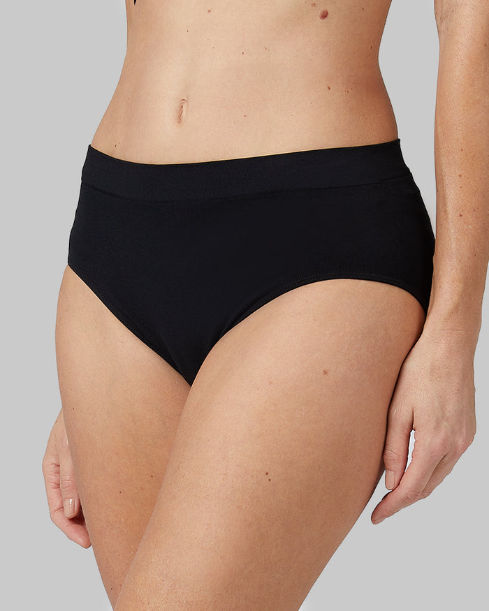 32 Degrees Tan _ Women's 3-Pack seamless stretch Comfort Brief {model: Sandrine is 5'9"and size 4, wearing size S}{bottom}{right} {bottom}{right}
