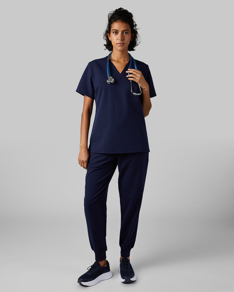 32 Degrees Navy _ Womens Cargo scrub Jogger {model: Arantza is 5