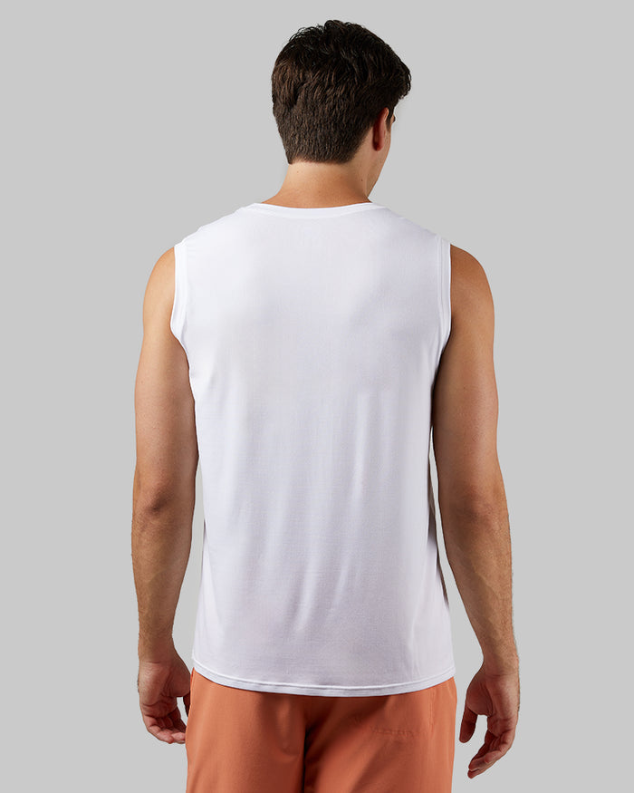 32 Degrees White _ Men's Cool Relaxed Tank {model: Zac is 6'3", wearing size M}{bottom}{right} {bottom}{right}